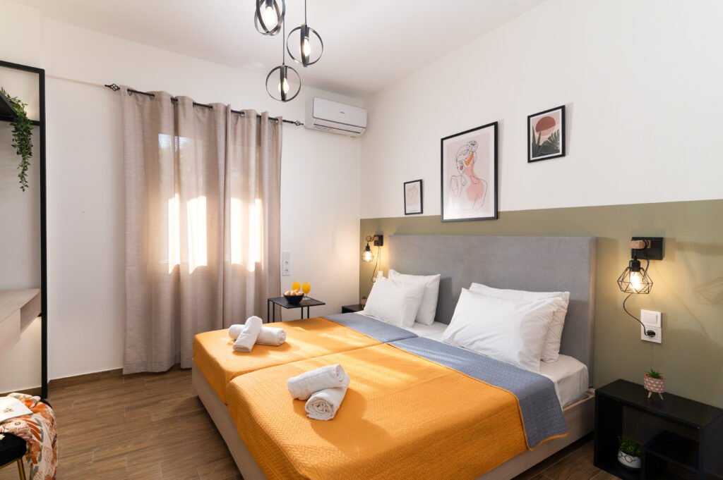 Modern bedroom in Agios Nikolaos with Smart TV, Netflix, and Starlink internet.