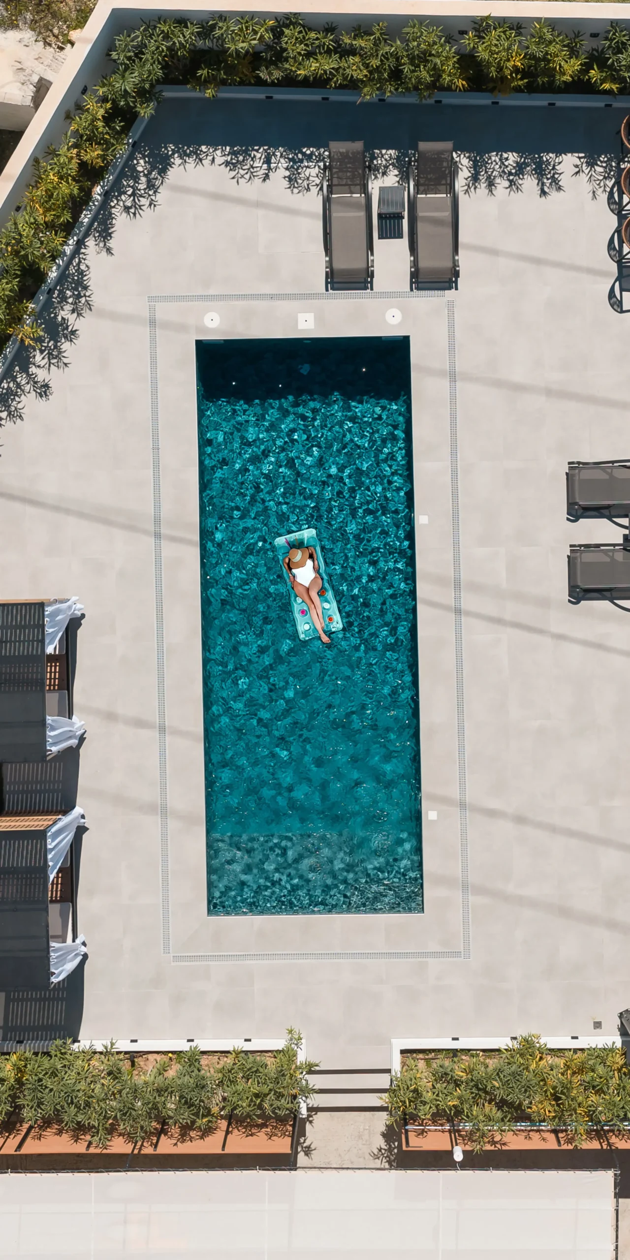 rias-apartment-aerial-top-down-pool-relaxation