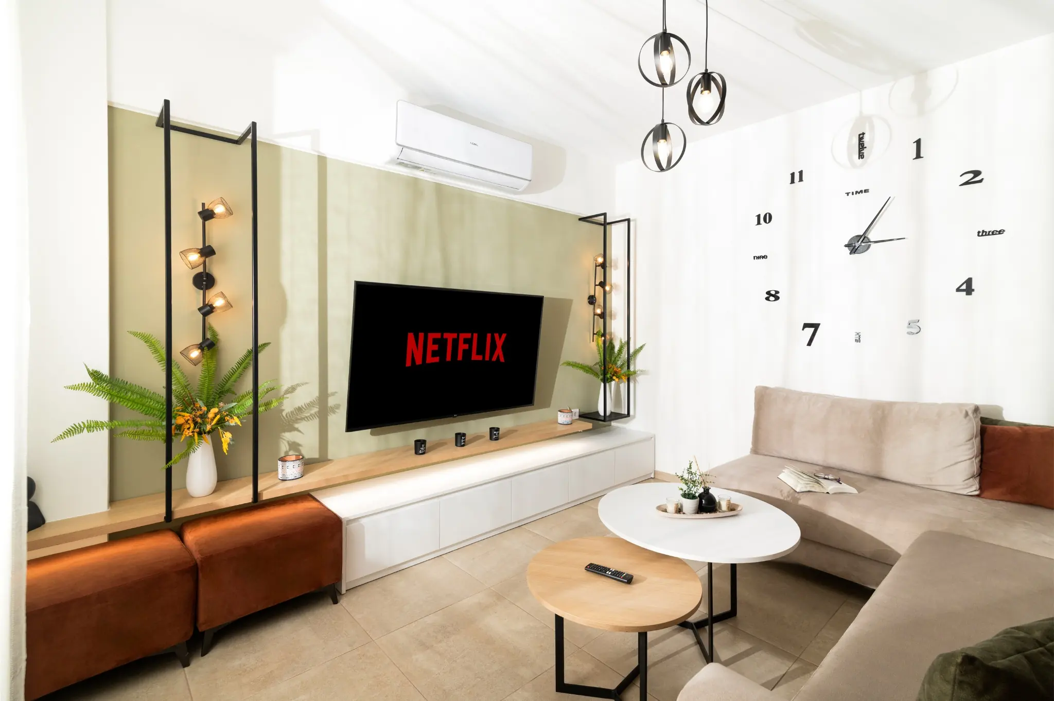 rias-apartment-modern-living-room-clock-agios-nikolaos