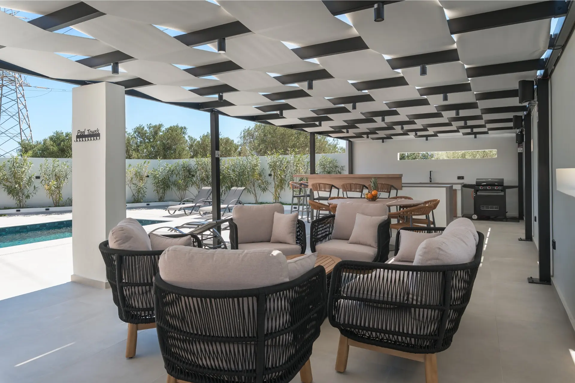 rias-apartment-outdoor-lounge-bbq-pool-area