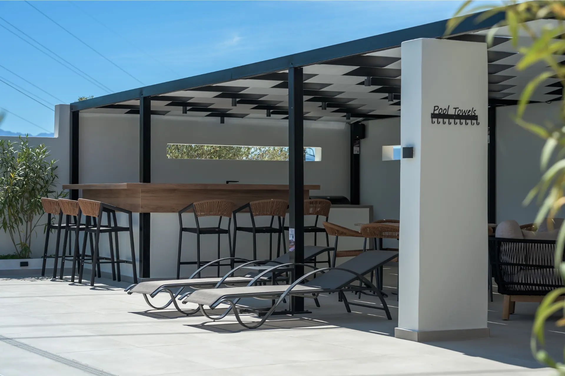 rias-apartment-outdoor-pool-bar-lounge-area