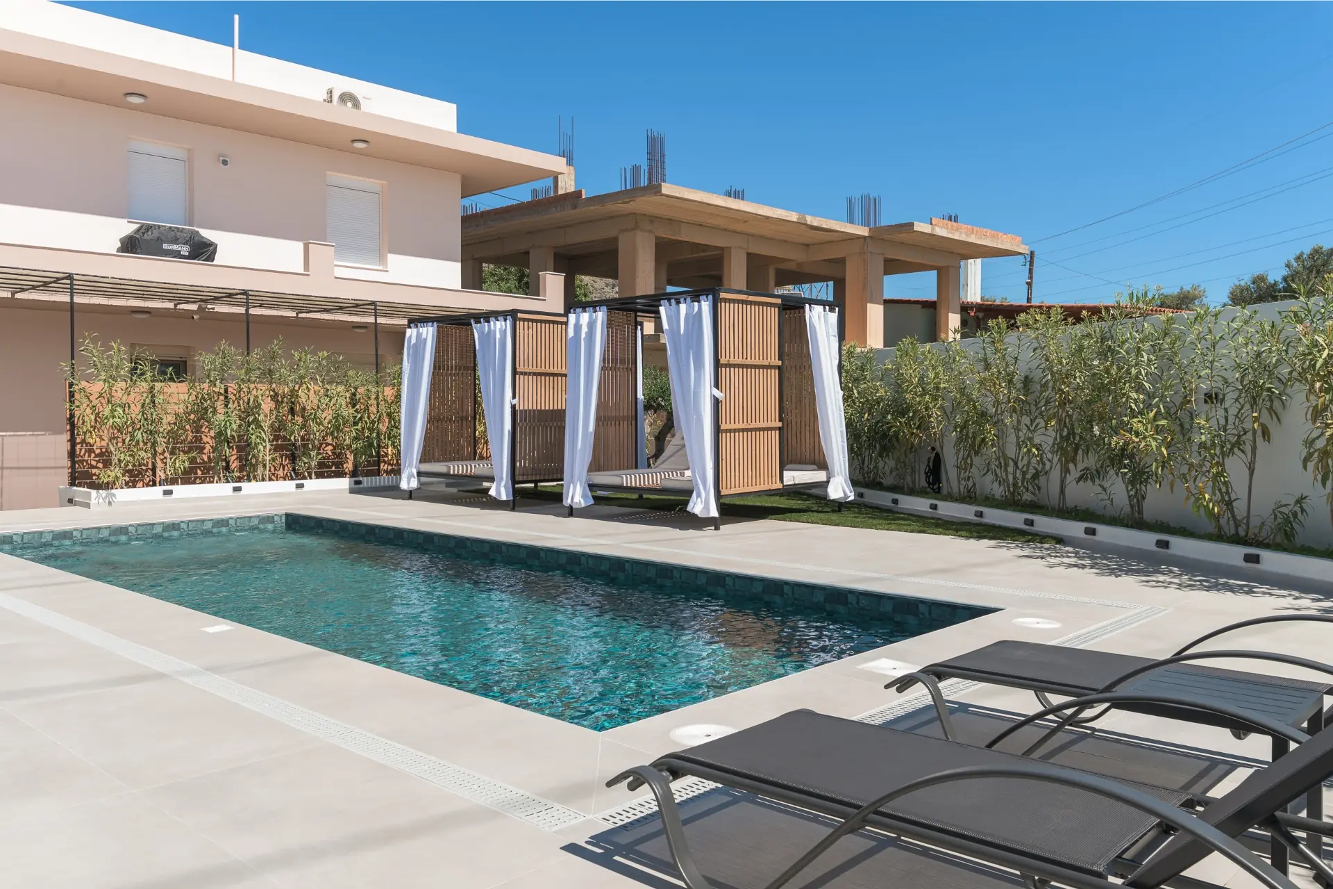 rias-apartment-pool-luxury-cabanas